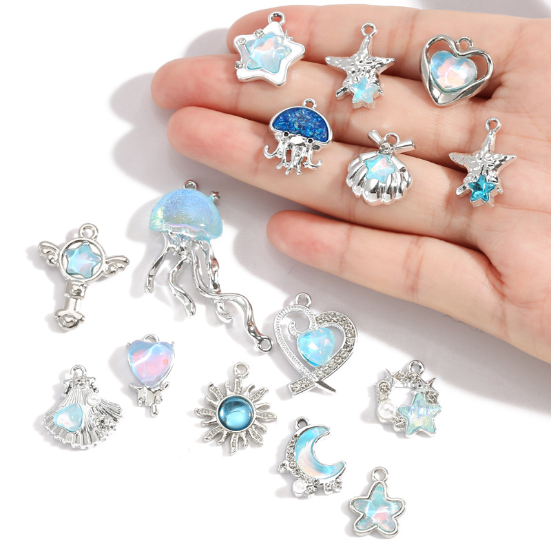 10Pcs 실버 도금 합금 크리스탈 스타 문 썬 참 펜 - Moon Star Earrings 리뷰 및 가격