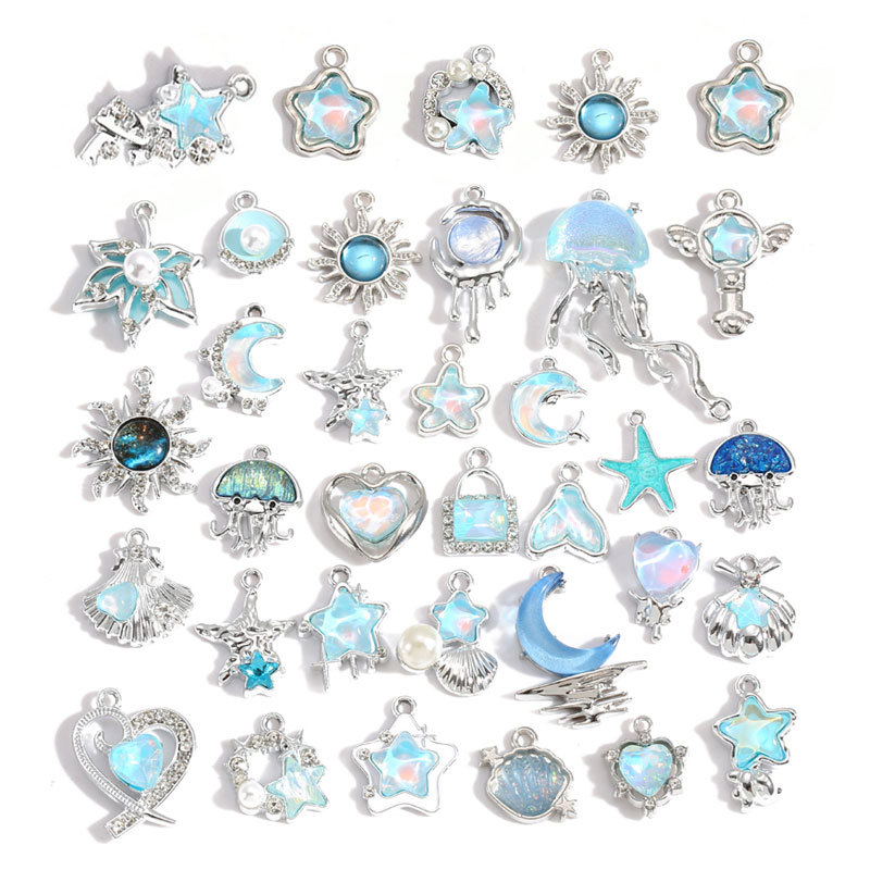 10Pcs 실버 도금 합금 크리스탈 스타 문 썬 참 펜 - Moon Star Earrings 리뷰 및 가격